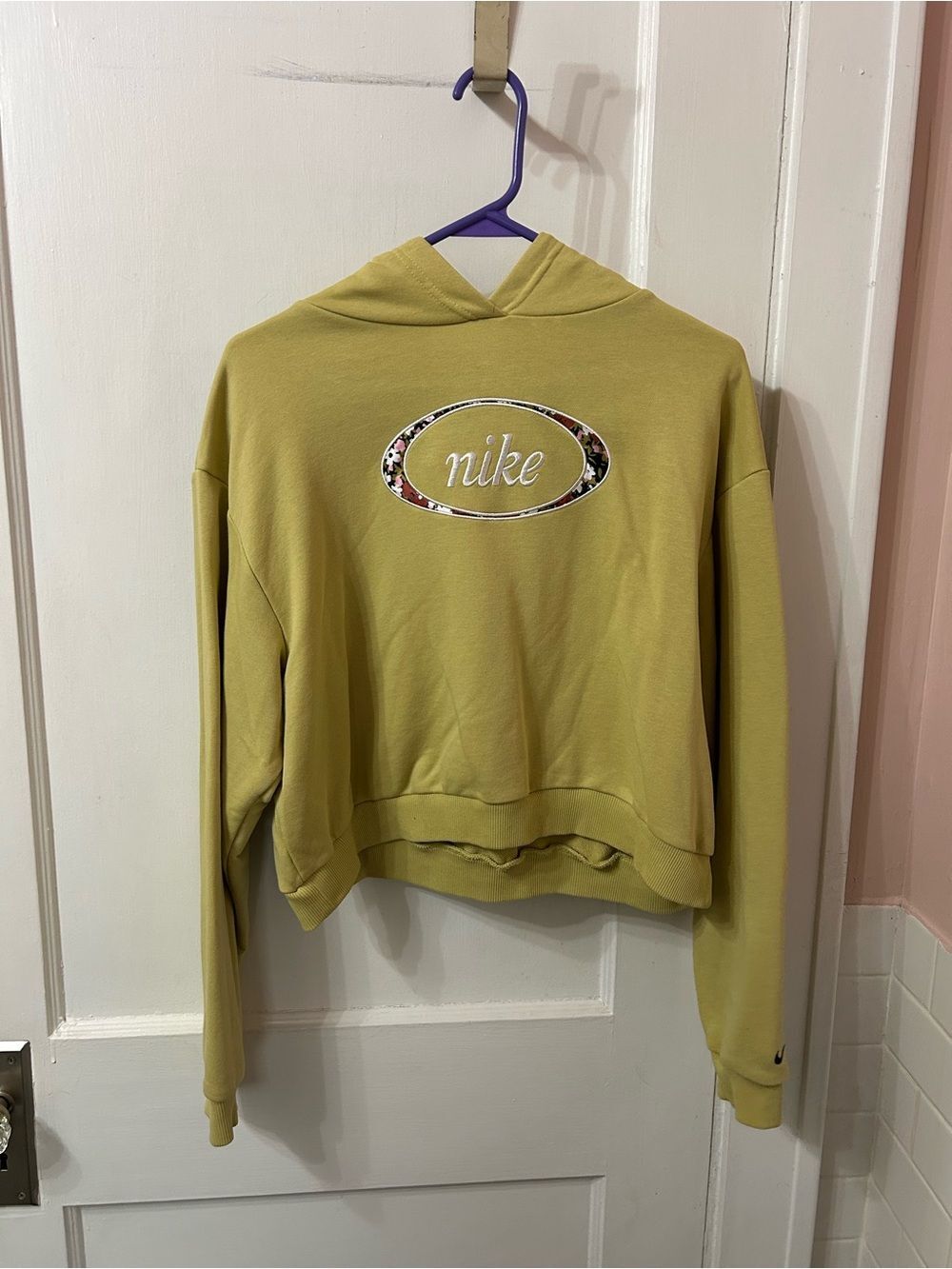 Nike Women's Light Yellow Cropped Hoodie with Embroidered Logo